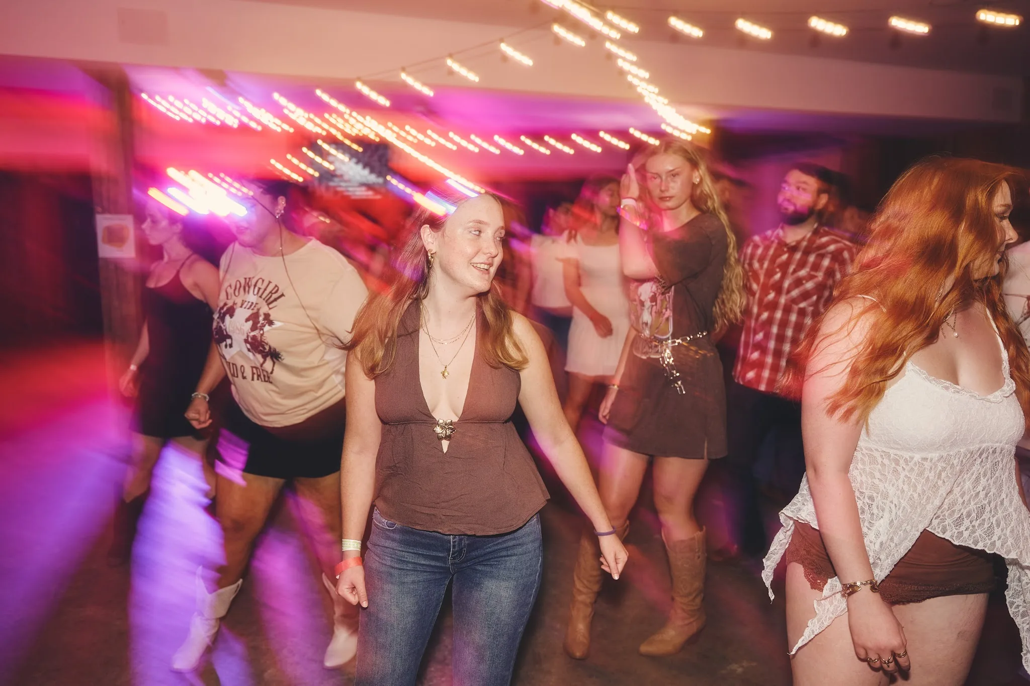 Line dancing at an All-American Country Nights