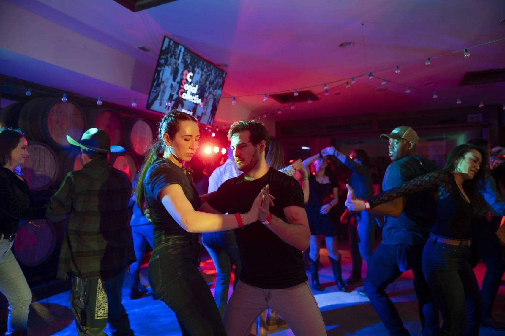 A packed dance floor at a Sangria y Salsa night