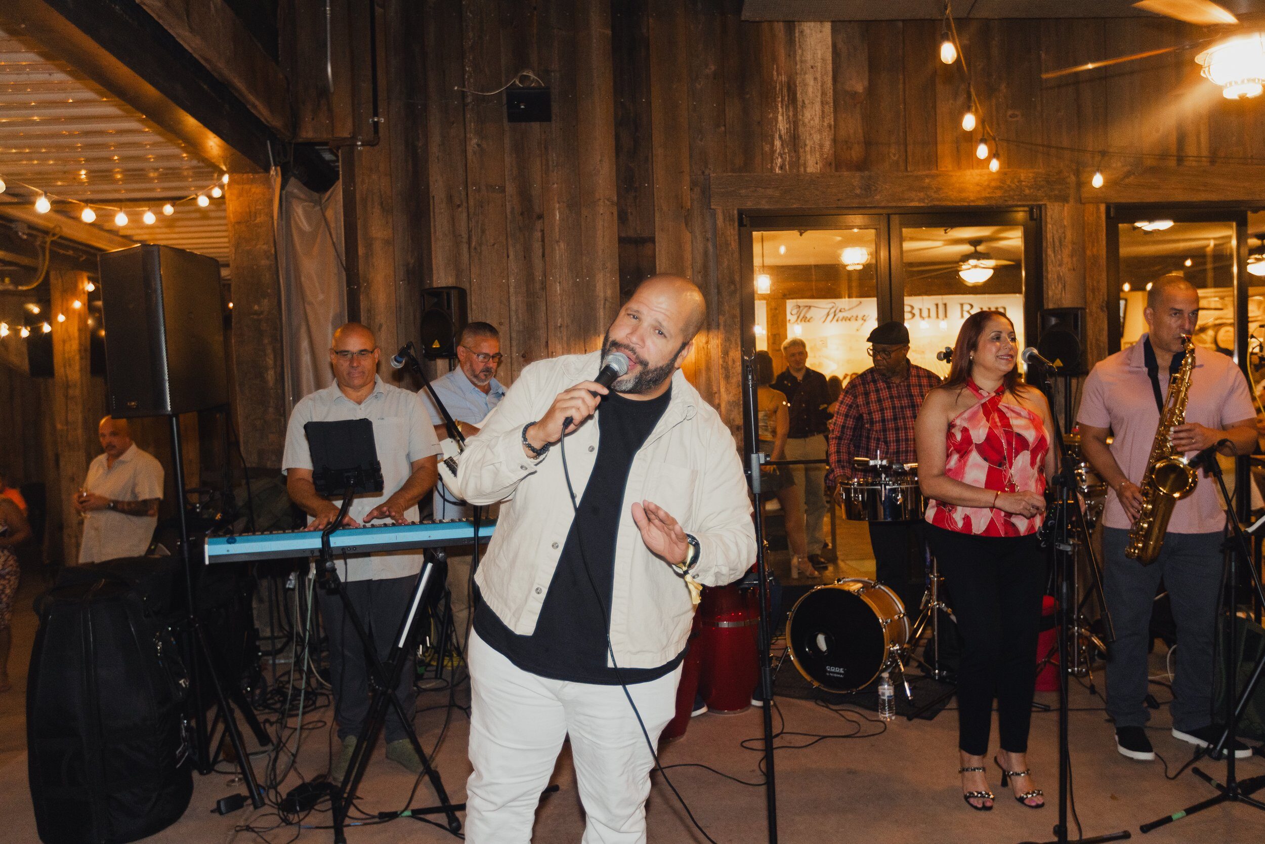 A live Latin band playing at Sangria y Salsa
